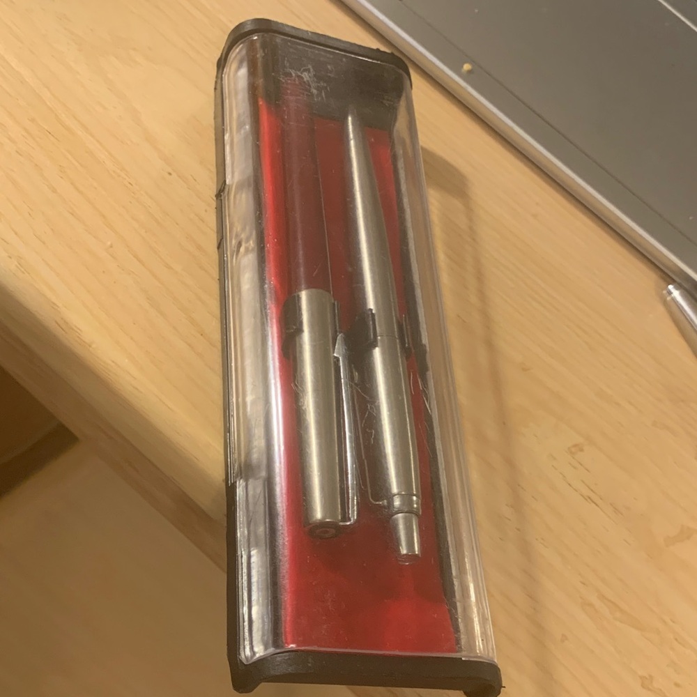 Parker Silver Pen and ink Set with Red Case
The dry pen needs new tube